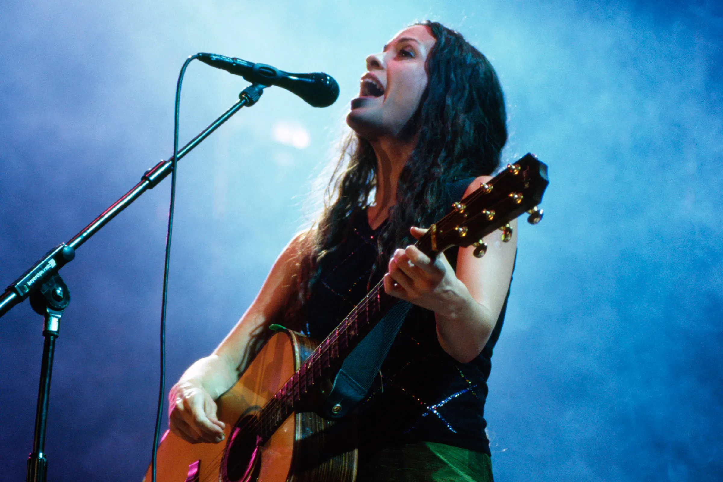 Alanis Morissette performing live on stage